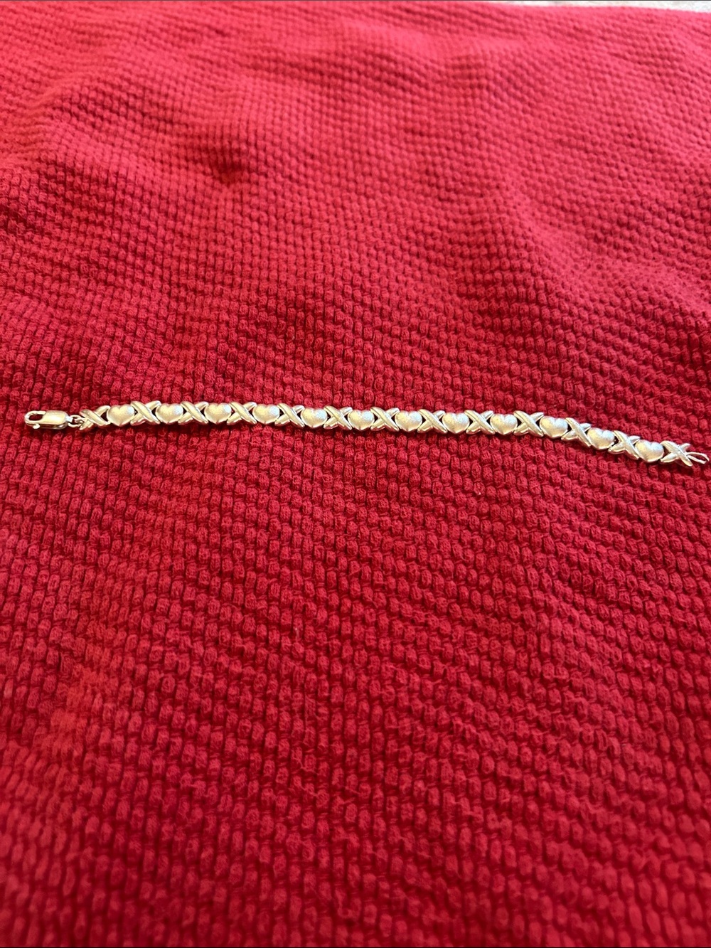 Beautiful 925 bracelet.  Little over 7.5 inches.  Nice weight.